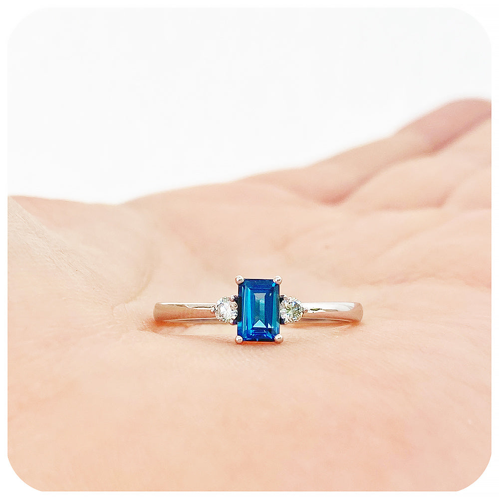 Emerald cut London Blue Topaz and Moissanite Trilogy Engagement Ring - Victoria's Jewellery