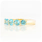 Danelle, a Swiss Blue Topaz Half Eternity Trellis Ring