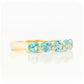 Danelle, a Swiss Blue Topaz Half Eternity Trellis Ring