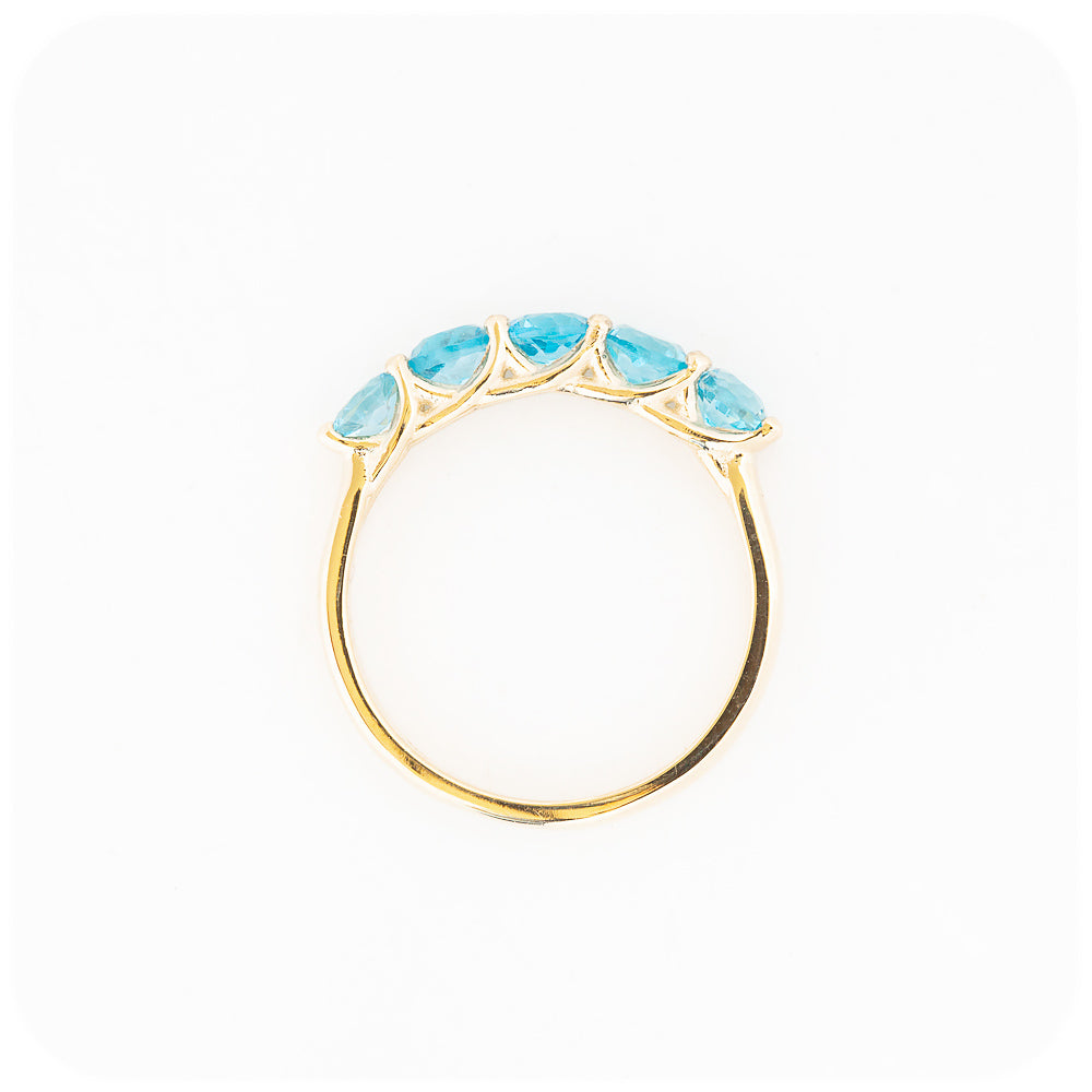 The Danelle, a Swiss Blue Topaz Half Eternity Trellis Ring
