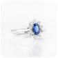 Eva, a Blue Sapphire and Moissanite Halo Ring