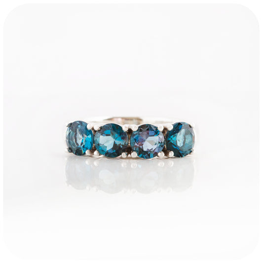 Round brilliant cut London Blue Topaz four stone Half Eternity Anniversary Ring - Victoria's Jewellery