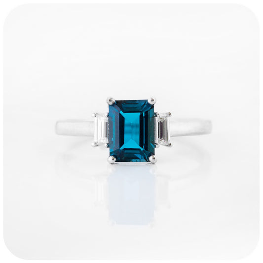 emerald cut teal london blue topaz and moissanite trilogy engagement ring - Victoria's Jewellery