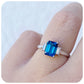Lisa, Emerald cut London Blue Topaz and Moissanite Engagement Ring