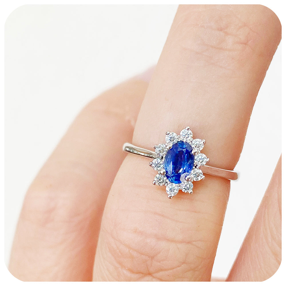 Eva, a Blue Sapphire and Moissanite Halo Ring