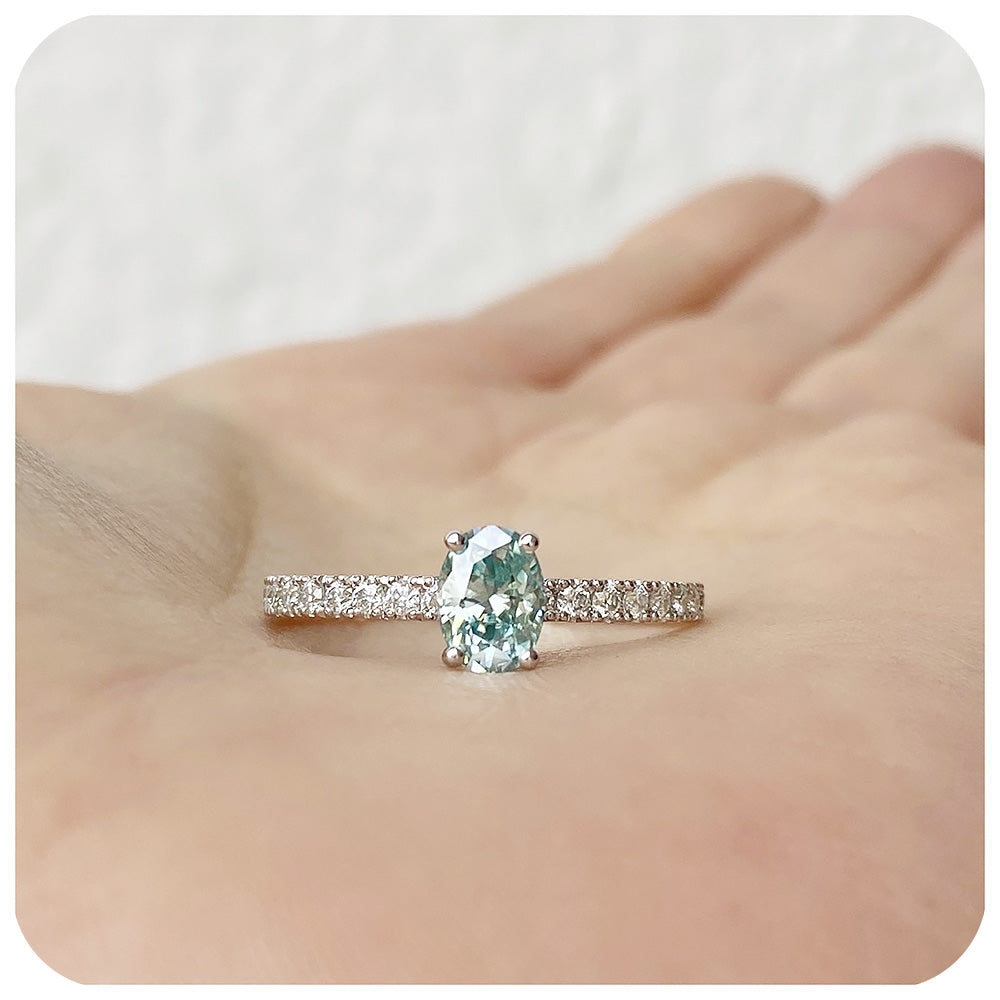 oval cut light blue moissanite with white shoulder accent stone engagement ring - Victoria's Jewellery