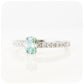 oval cut light blue moissanite with white shoulder accent stone engagement ring - Victoria's Jewellery