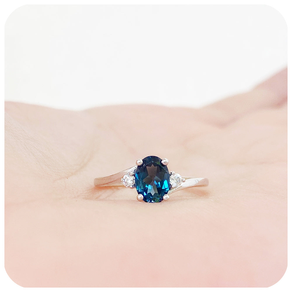 Oval cut London Blue Topaz and Lab Diamond Trilogy Engagement Ring in White Gold - Victoria's Jewellery