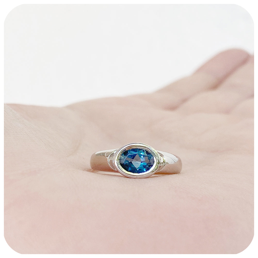 Oval cut London Blue Topaz Solitaire Ring in Sterling Silver