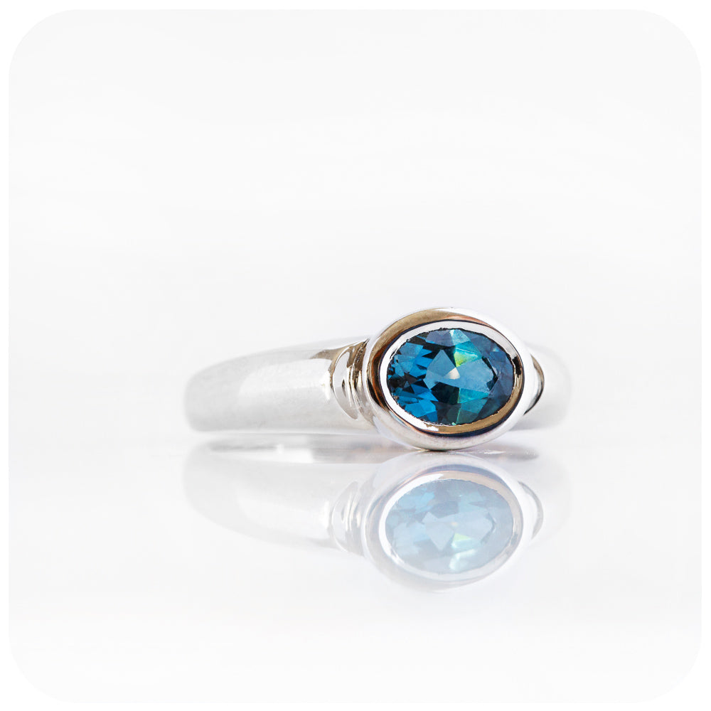 Oval cut London Blue Topaz Solitaire Ring in Sterling Silver