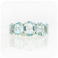 oval cut graduated sky blue topaz half eternity anniversary or birthstone ring