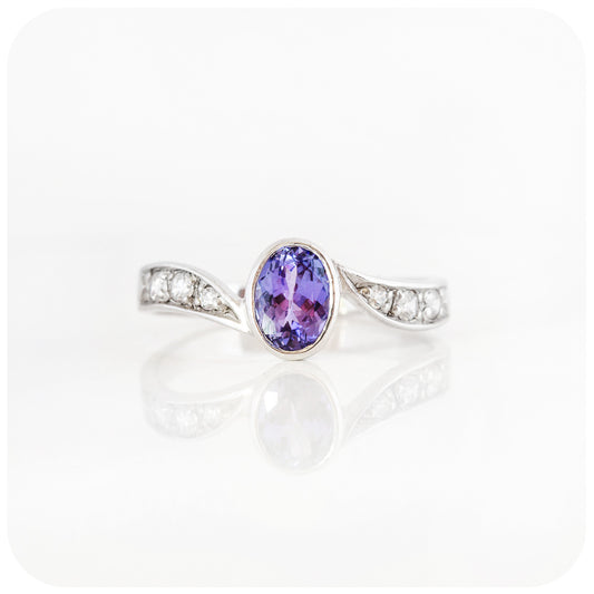 Oval cut Tanzanite and Cubic Zirconia Ring in Sterling Silver