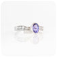 oval cut tanzanite and cubic zirconia twisted band ring in sterling silver