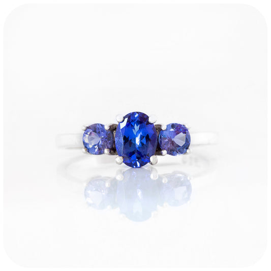 Oval and Round cut Tanzanite Trilogy Ring in Gold