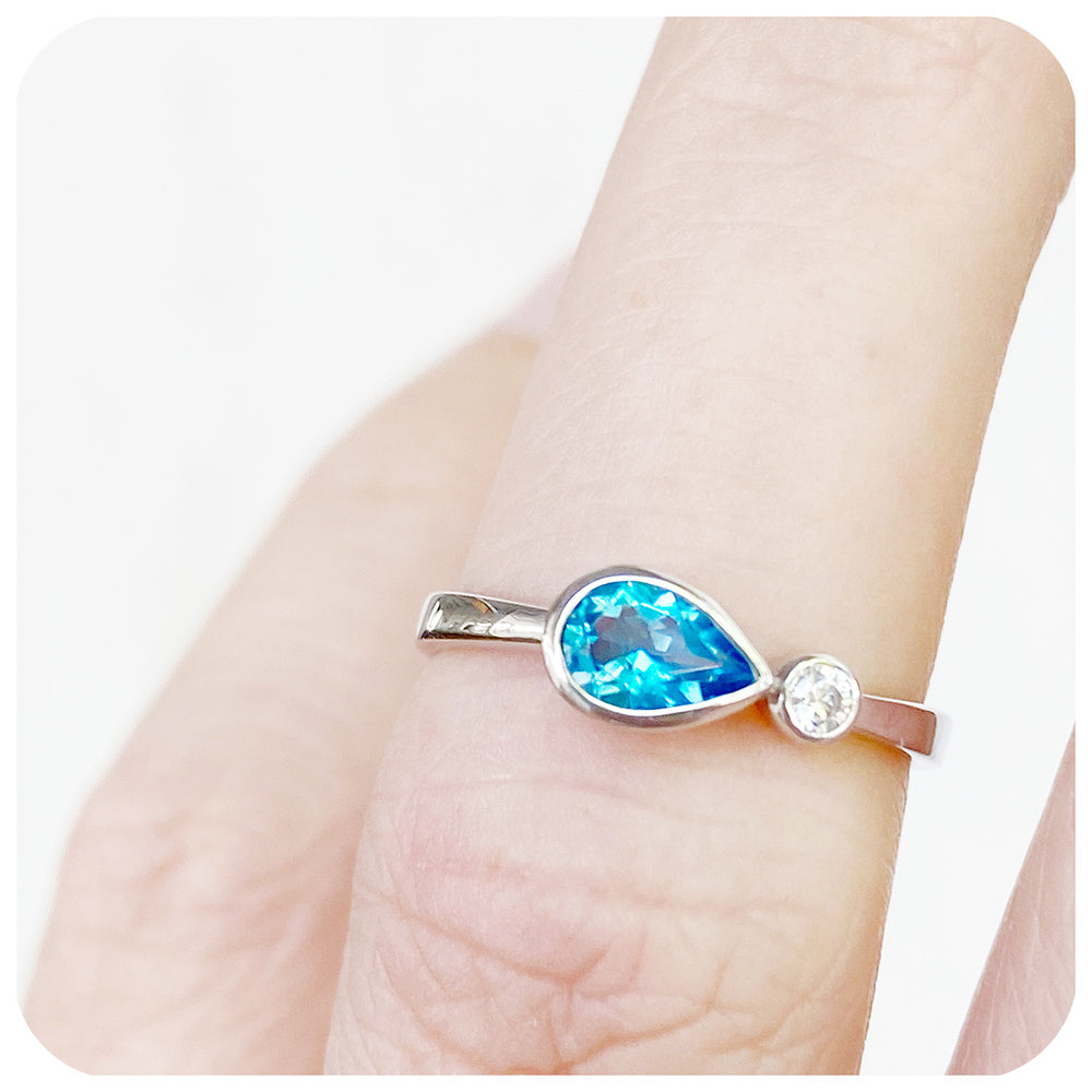 Pear cut swiss blue topaz and cubic zirconia east-west ring - Victoria's Jewellery