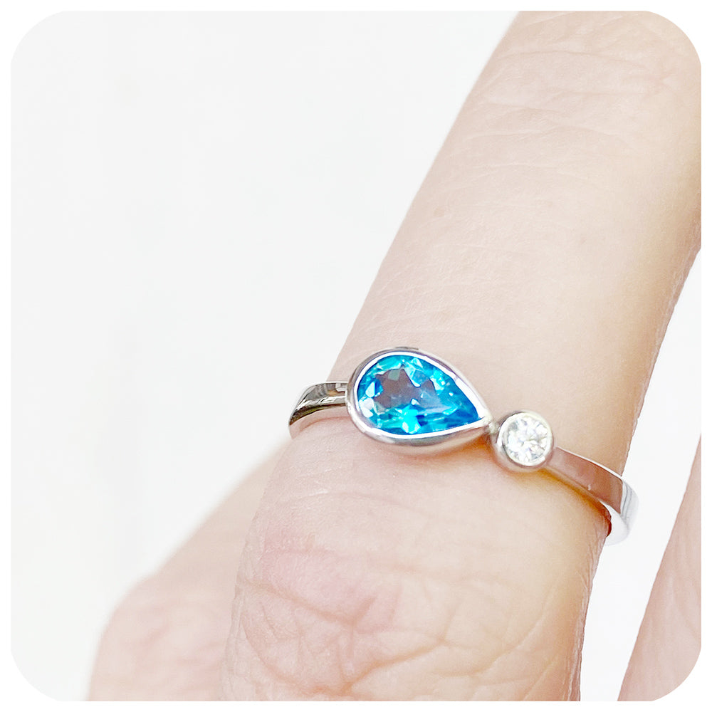 Pear cut swiss blue topaz and cubic zirconia east-west ring - Victoria's Jewellery