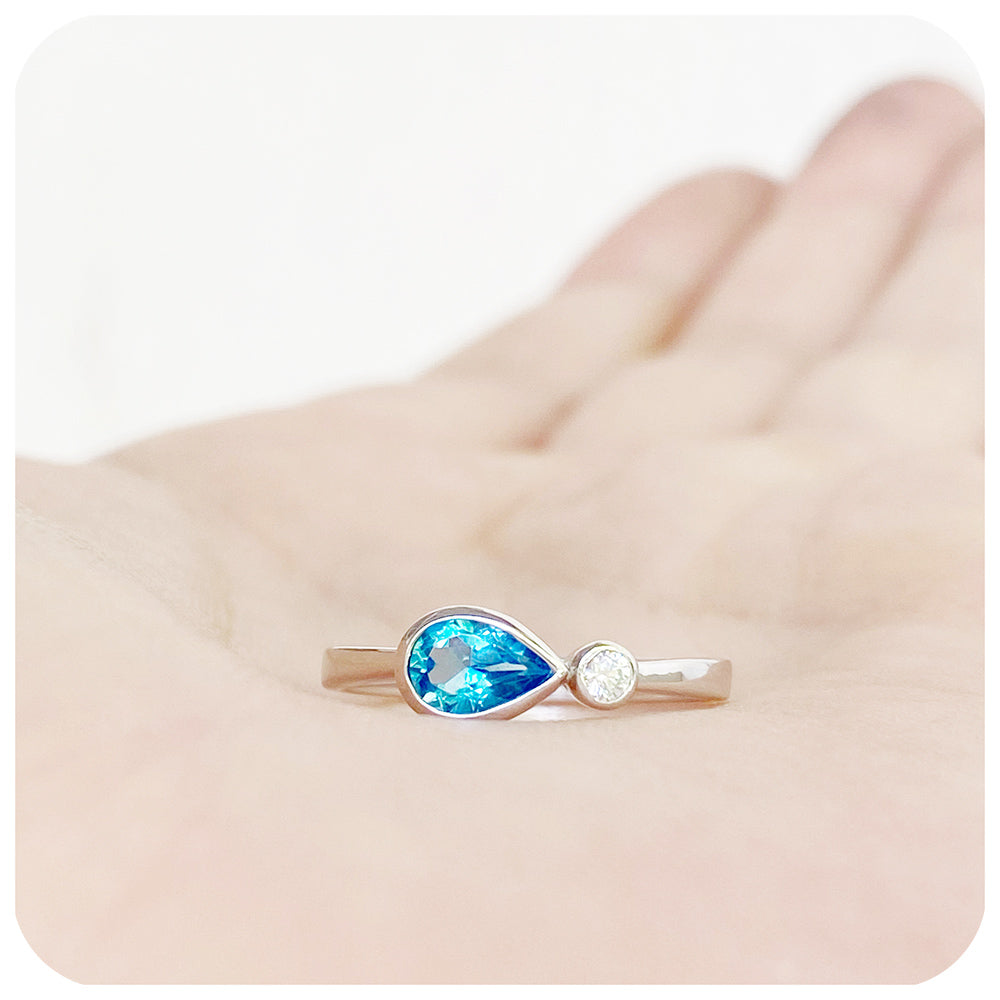 Pear cut swiss blue topaz and cubic zirconia east-west ring - Victoria's Jewellery