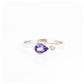 Pear cut Tanzanite and Moissanite Ring