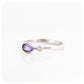 Pear cut Tanzanite and Moissanite Ring