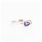 Pear cut Tanzanite and Moissanite Ring