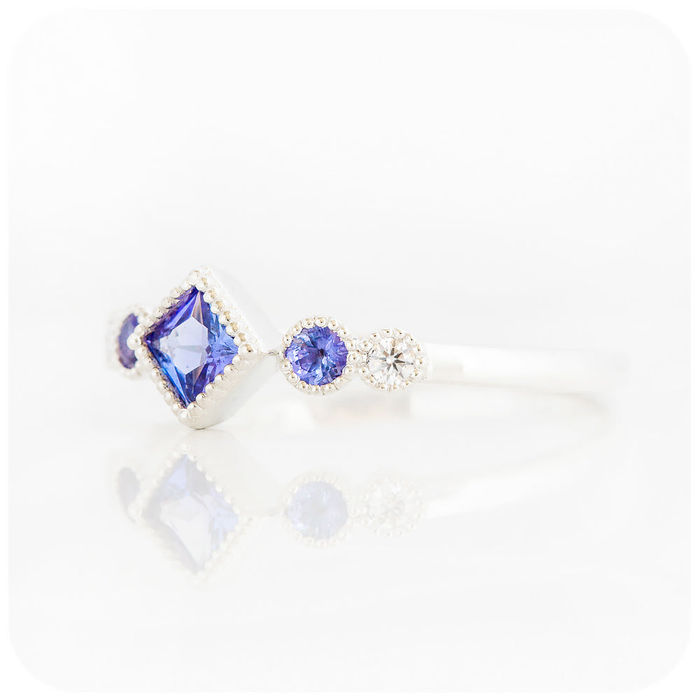 princess cut tanzanite and moissanite half eternity ring with mill grain detail - Victoria's Jewellery