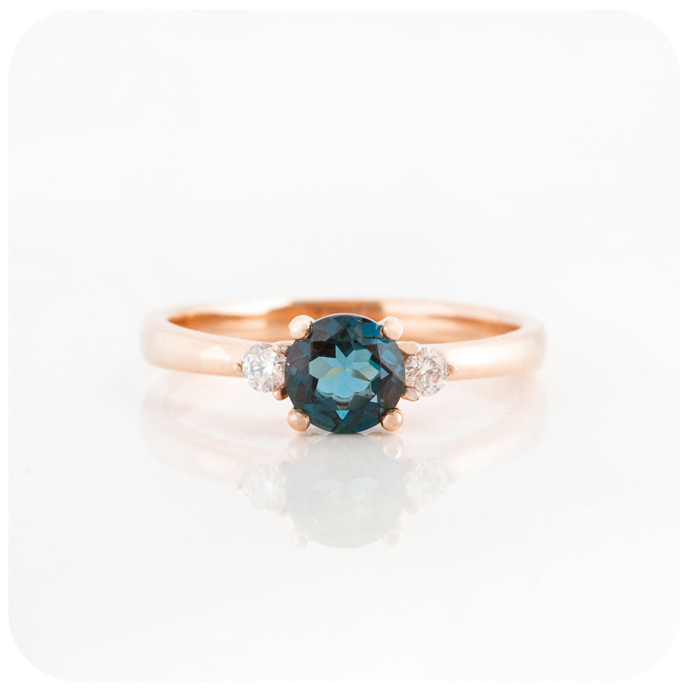 teal london blue topaz and moissanite trilogy style enagement ring in rose gold - Victoria's Jewellery