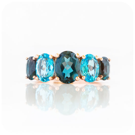 Oval cut Graduated London and Swiss Blue Topaz Anniversary or November Birthstone Ring in Rose Gold - Victoria's Jewellery