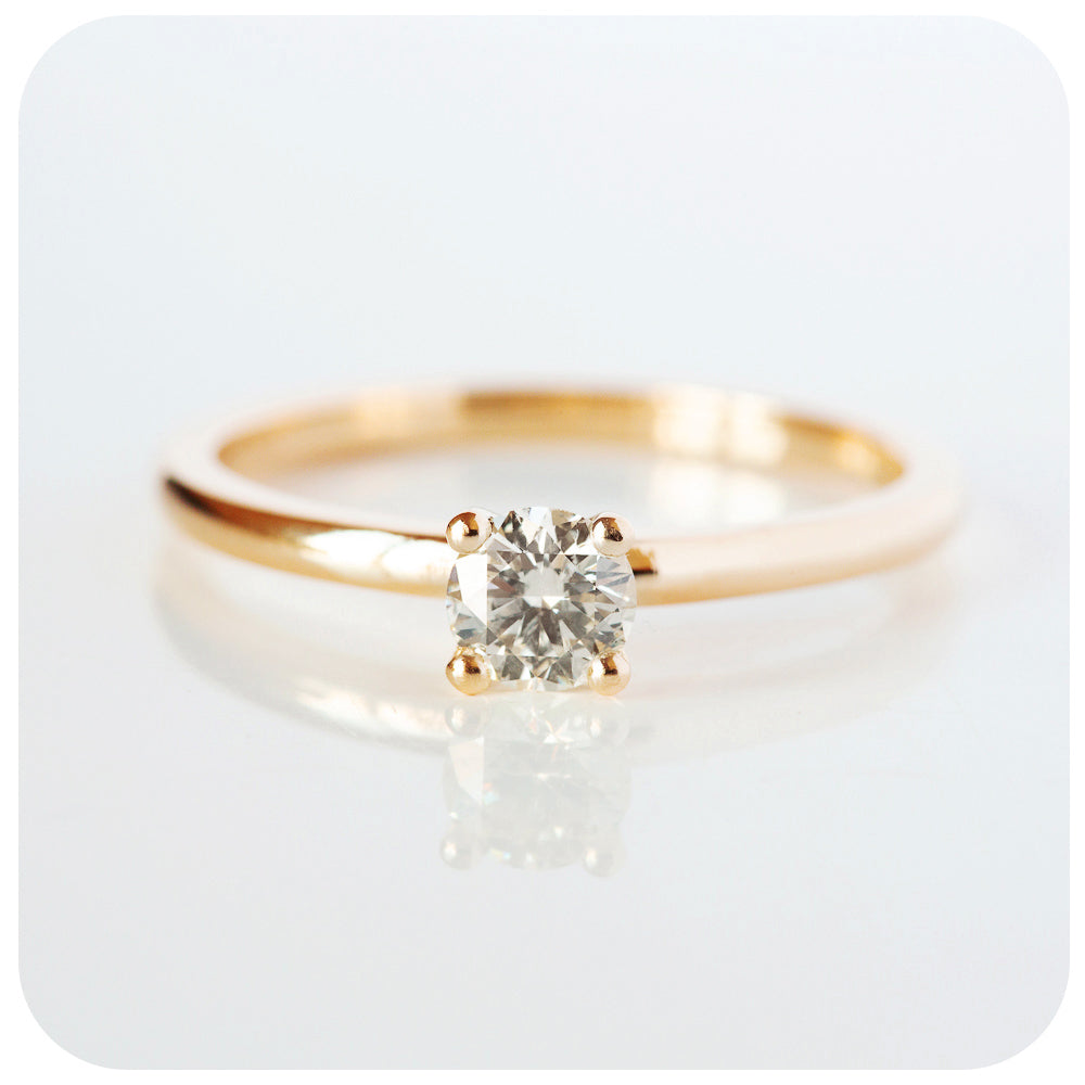 The 4 Claw Brilliant cut Moissanite Ring
