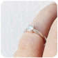 April, a Brilliant cut Moissanite Solitaire Ring