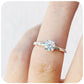 April, a Brilliant cut Moissanite Solitaire Ring