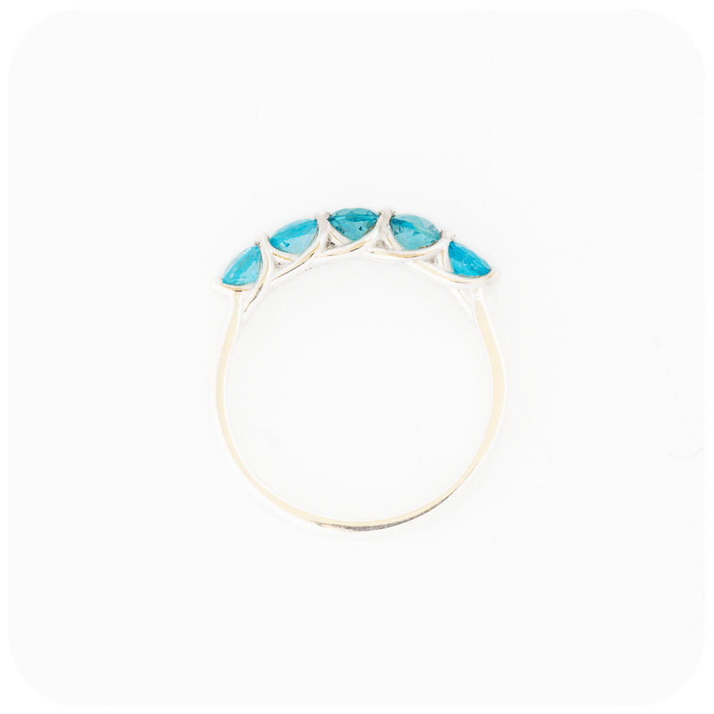 Danelle, a Swiss Blue Topaz Half Eternity Trellis Ring