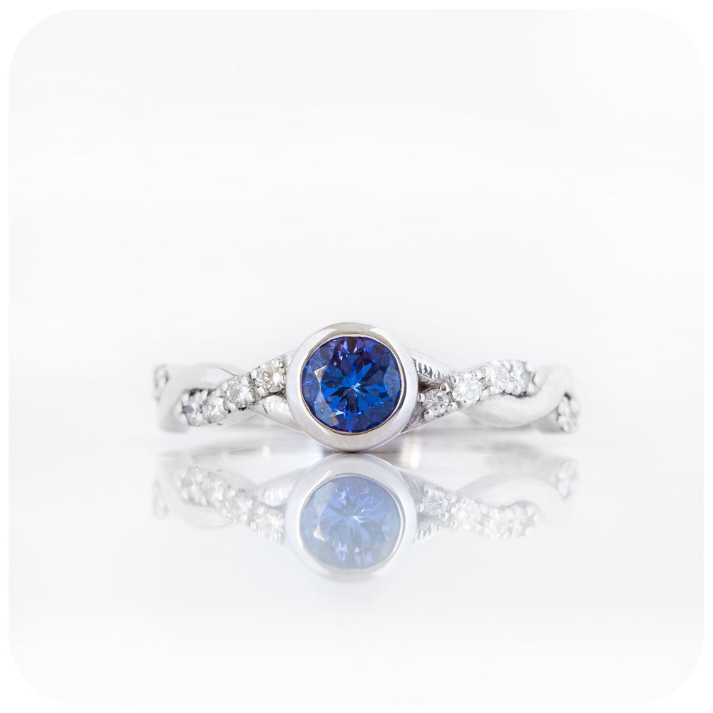The Infinity, Tanzanite and Moissanite Ring in White Gold
