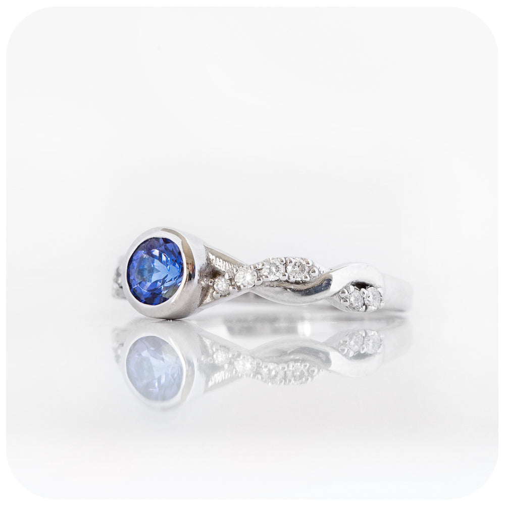 The Infinity, Tanzanite and Moissanite Ring in White Gold