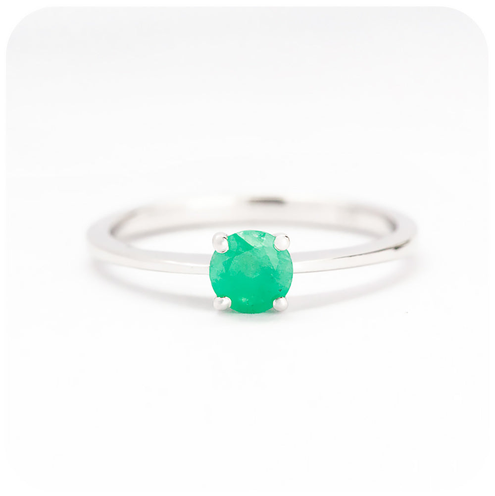 Round cut Emerald Solitaire Ring