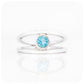 Round cut Swiss Blue Topaz Ring with a Split Band Design in Sterling Silver