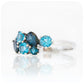 The Ena, a Cluster Ring with London and Swiss Blue Topaz