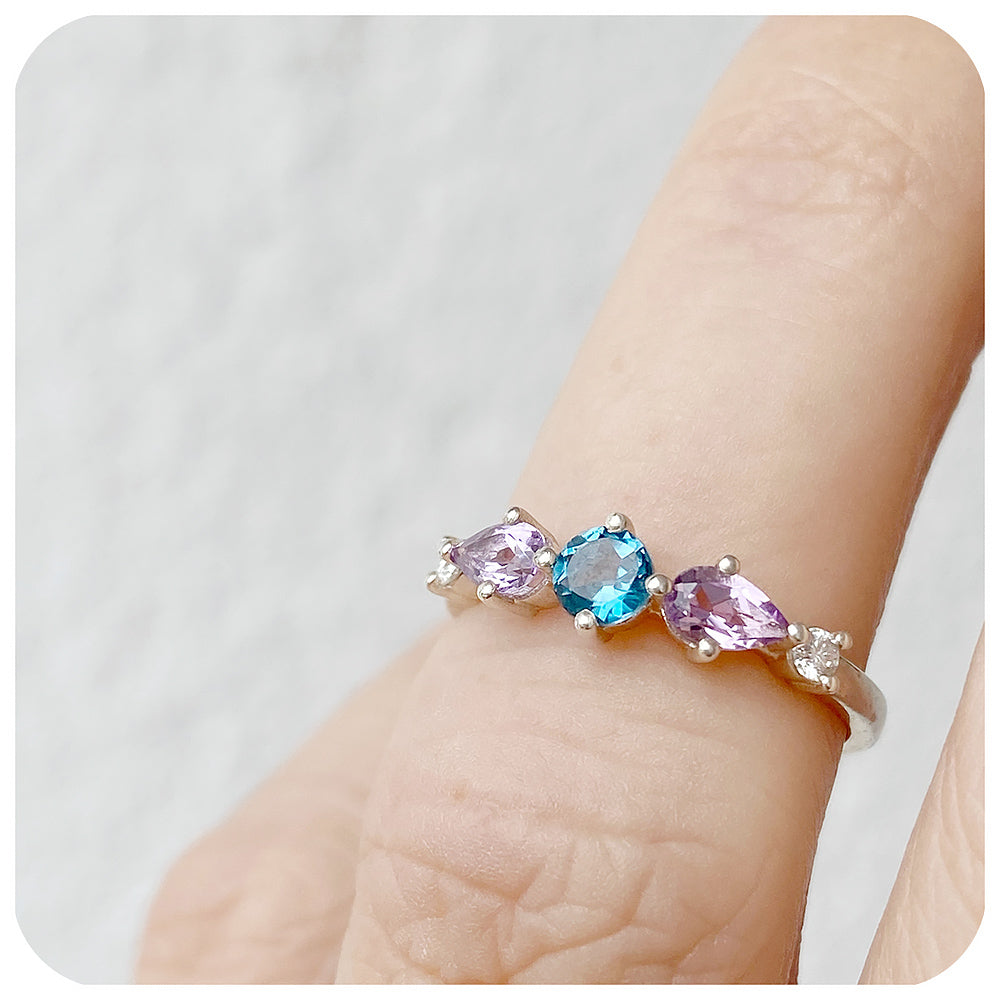 Rina, a Topaz, Amethyst and Moissanite Stack Ring