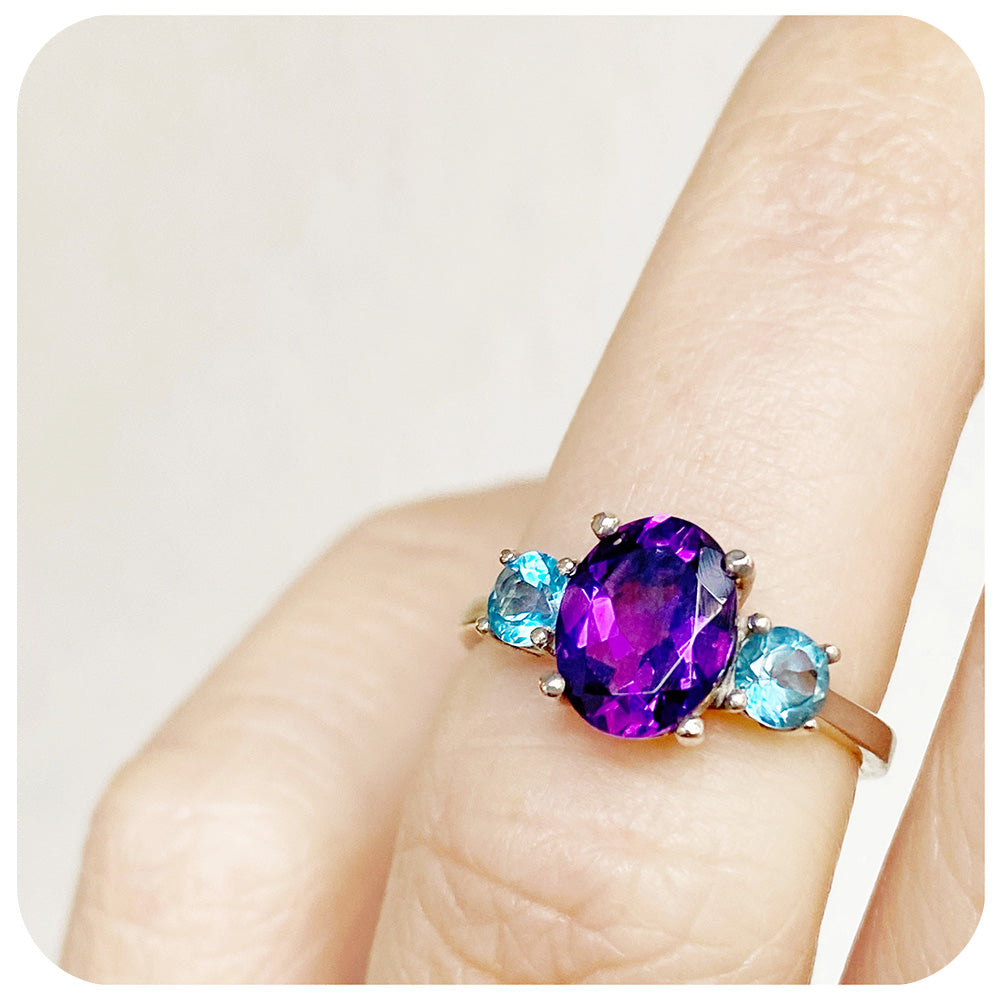 Oval cut Amethyst and Blue Topaz Trilogy Anniversary Ring - Victoria's Jewellery