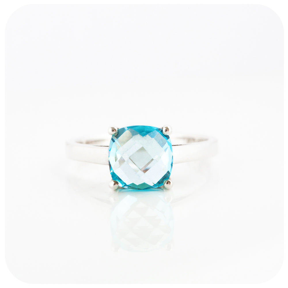 Cushion cut Sky Blue Topaz Solitaire Ring in Sterling Silver