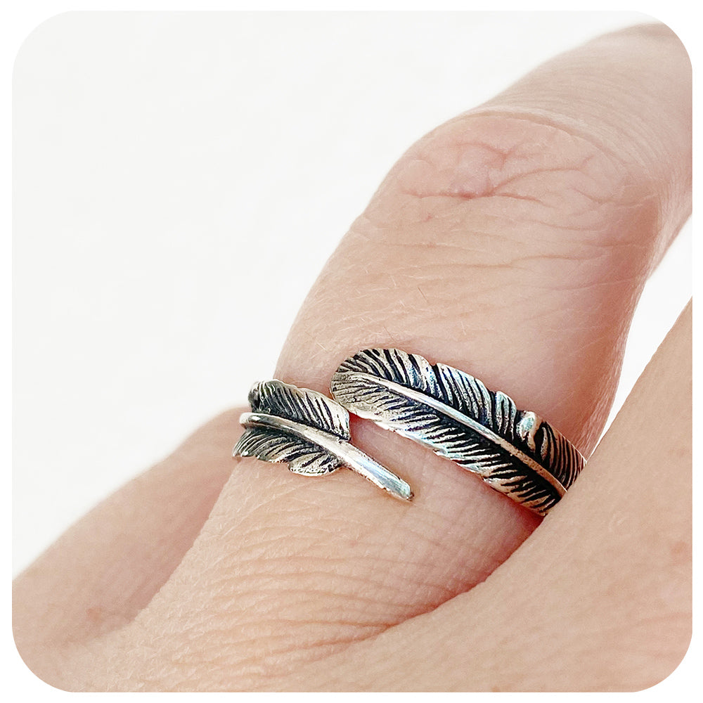 sterling silver feather ring with oxidised details