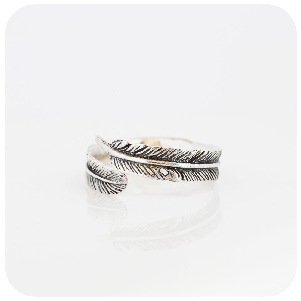 sterling silver feather ring with oxidised details