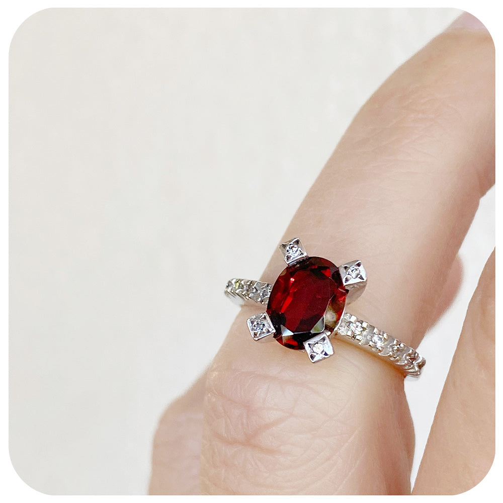 Oval Cut Garnet Ring in Sterling Silver with Cubic Zirconia Detail - Victoria's Jewellery