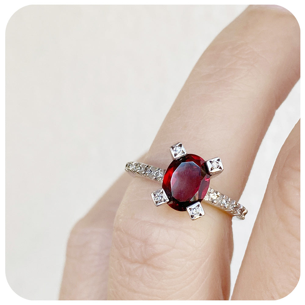 Oval Cut Garnet Ring in Sterling Silver with Cubic Zirconia Detail - Victoria's Jewellery