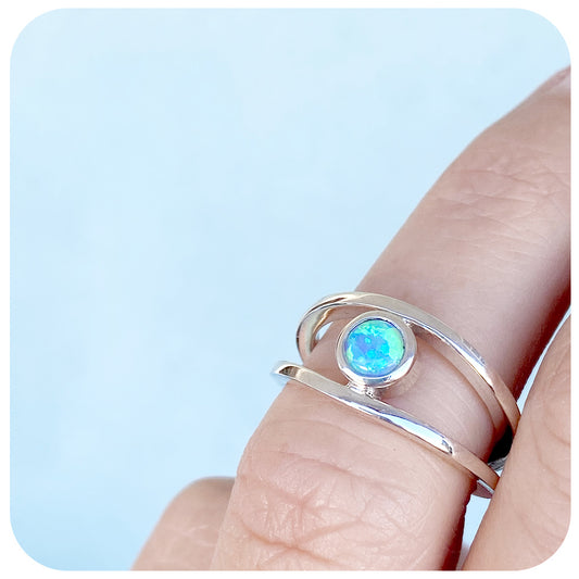 Round cut Gilson Opal Ring with a Split Band in Sterling Silver