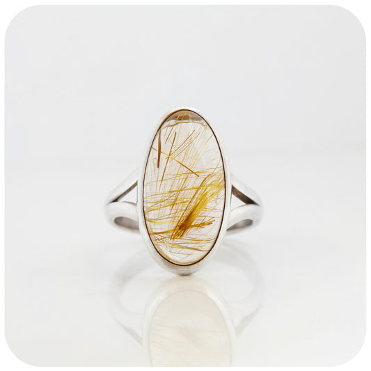 oval cabochon cut golden rutile quartz ring