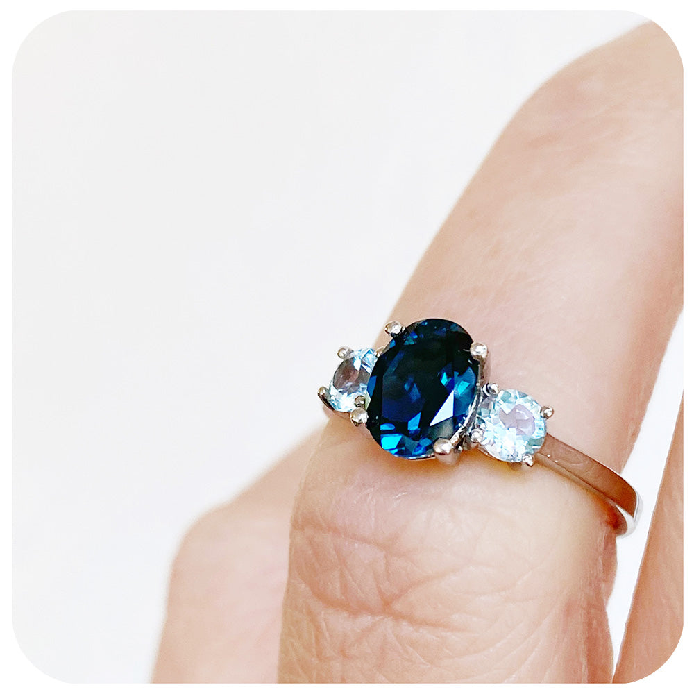 The Oval cut London Blue and Sky Blue Topaz Trilogy Ring - 8x6mm