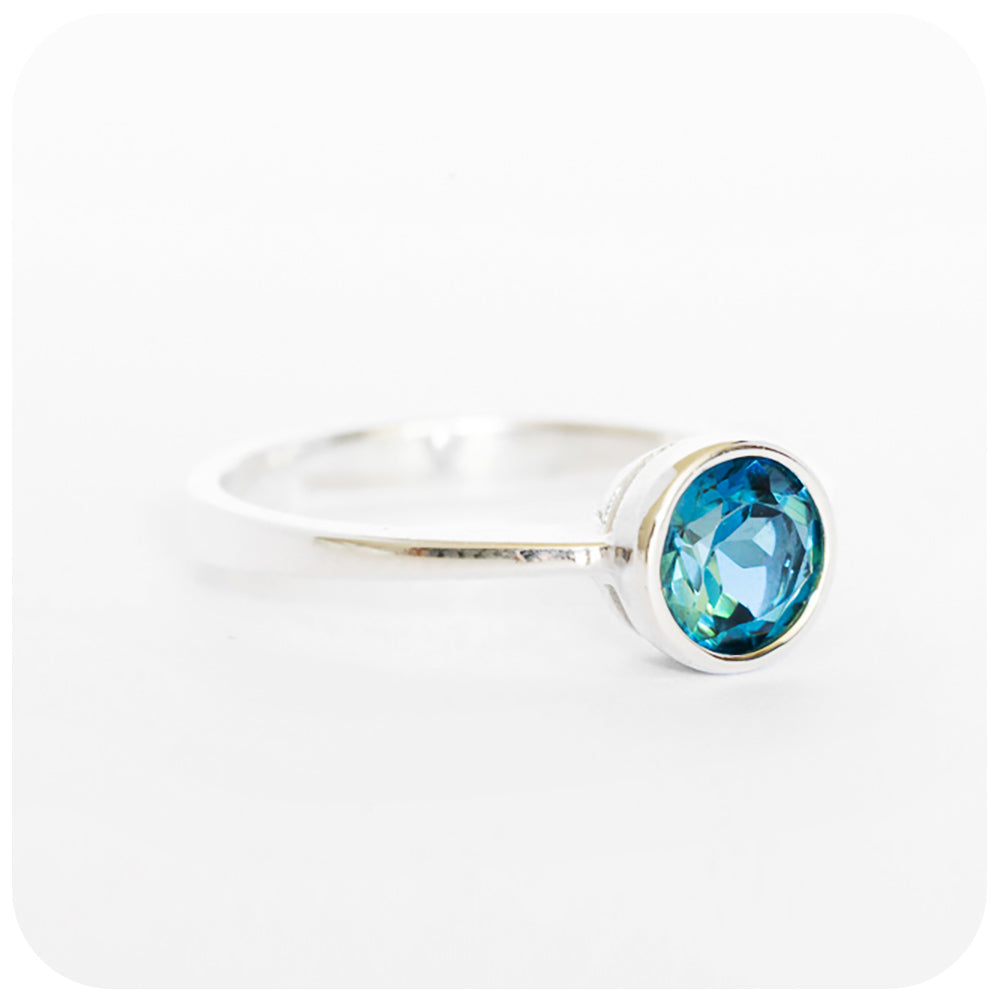 Round cut London Blue Topaz Solitaire Ring in Sterling Silver