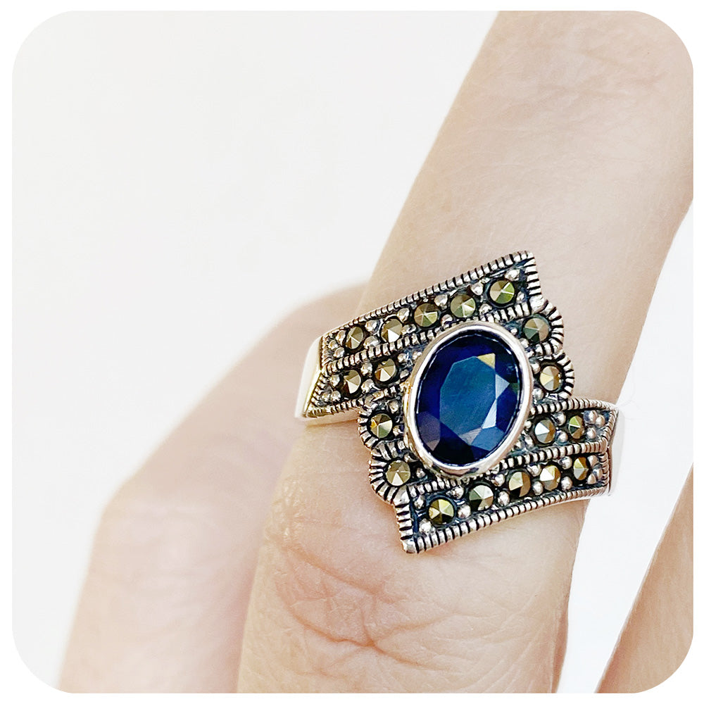 The Victorian Oval cut Blue Sapphire and Marcasite Ring in Sterling Silver