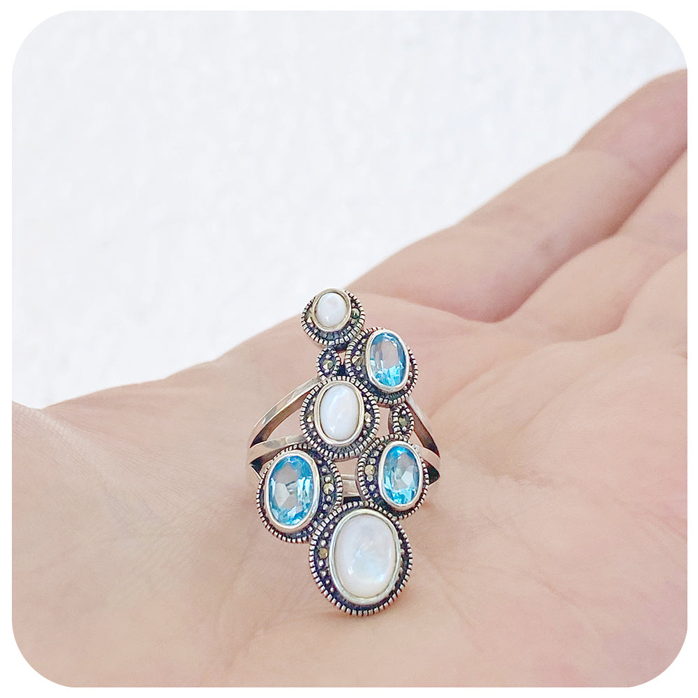 Blue Topaz and Mother of Pearl Ring with Marcasite