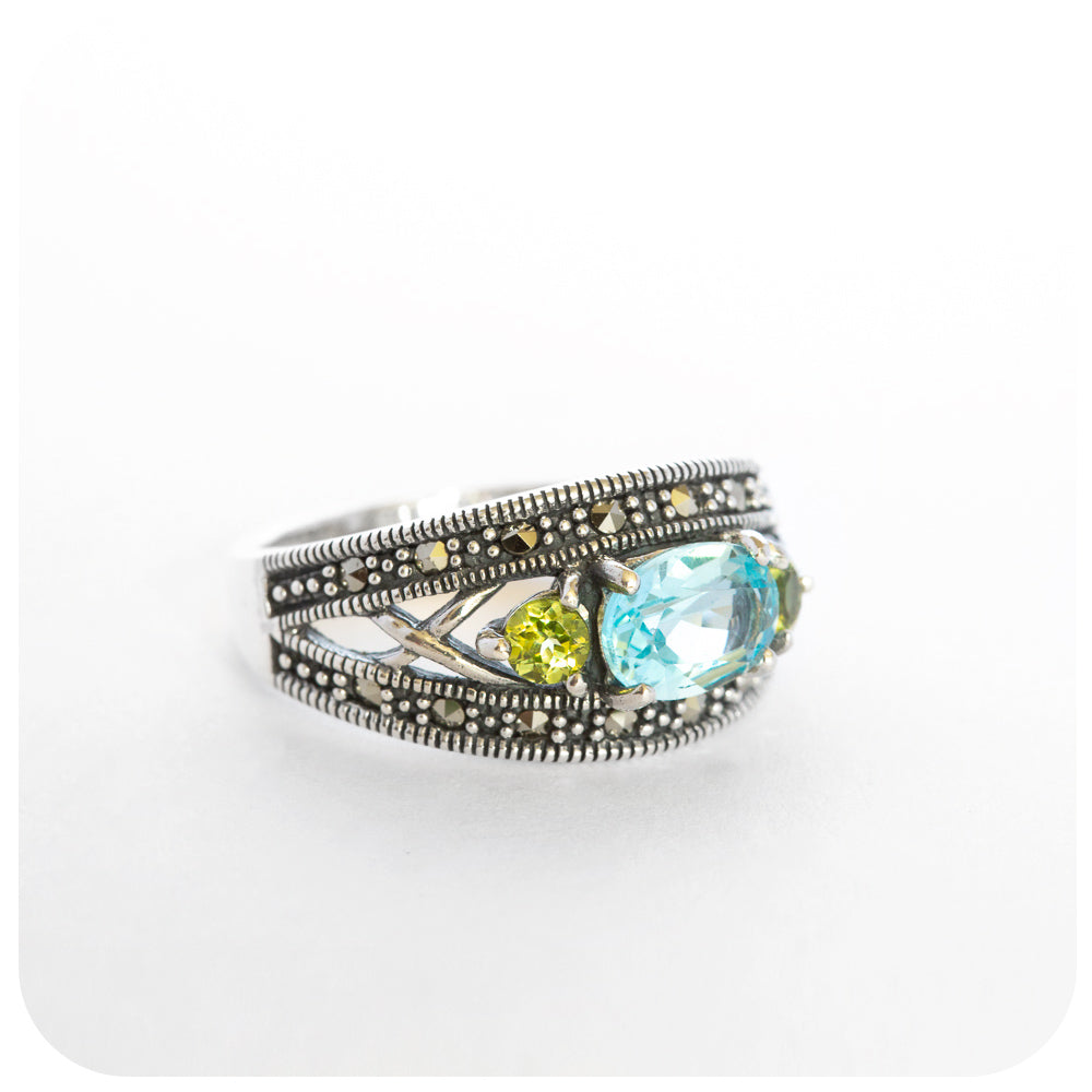 The Vintage Sky Blue Topaz and Peridot and Marcasite Trilogy Ring in Sterling Silver